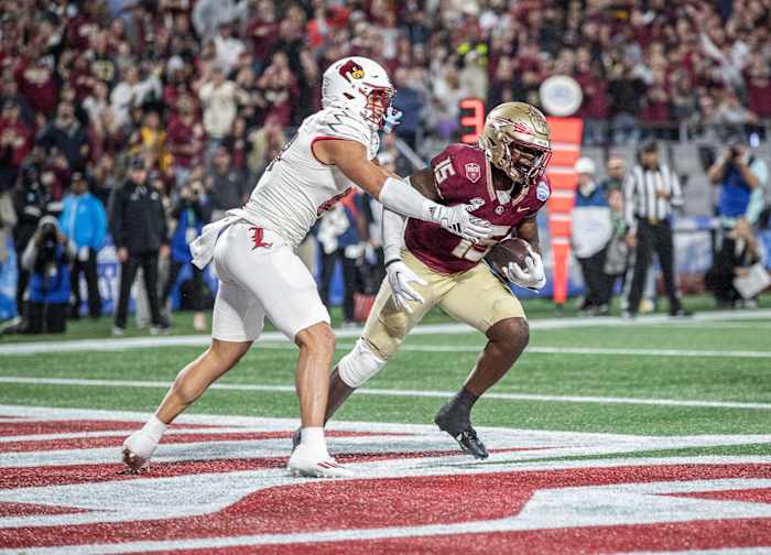 FSU linebacker Tatum Bethune (15) came up with a critical interception in the end zone as the Louisville Cardinals faced off against the Florida State Seminoles at Bank of America Field in Charlotte, NC. FSU defeated Louisville 16-6 to win the 2023 ACC Championship. Dec. 2, 2023.  